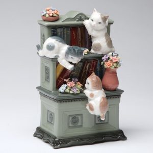 Porcelain musical Kittens on Bookshelf