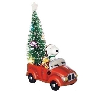 Snoopy and Woodstock in red car with Christmas Tree