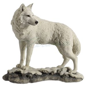 White wolf looking back figurine