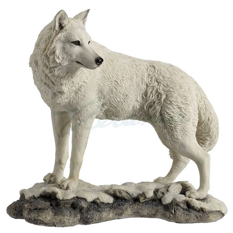 White wolf looking back figurine