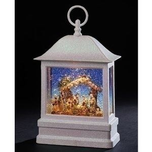 Large white lantern with lighted full nativity scene inside