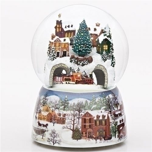 Larger water globe with a revolving train under a snow covered village